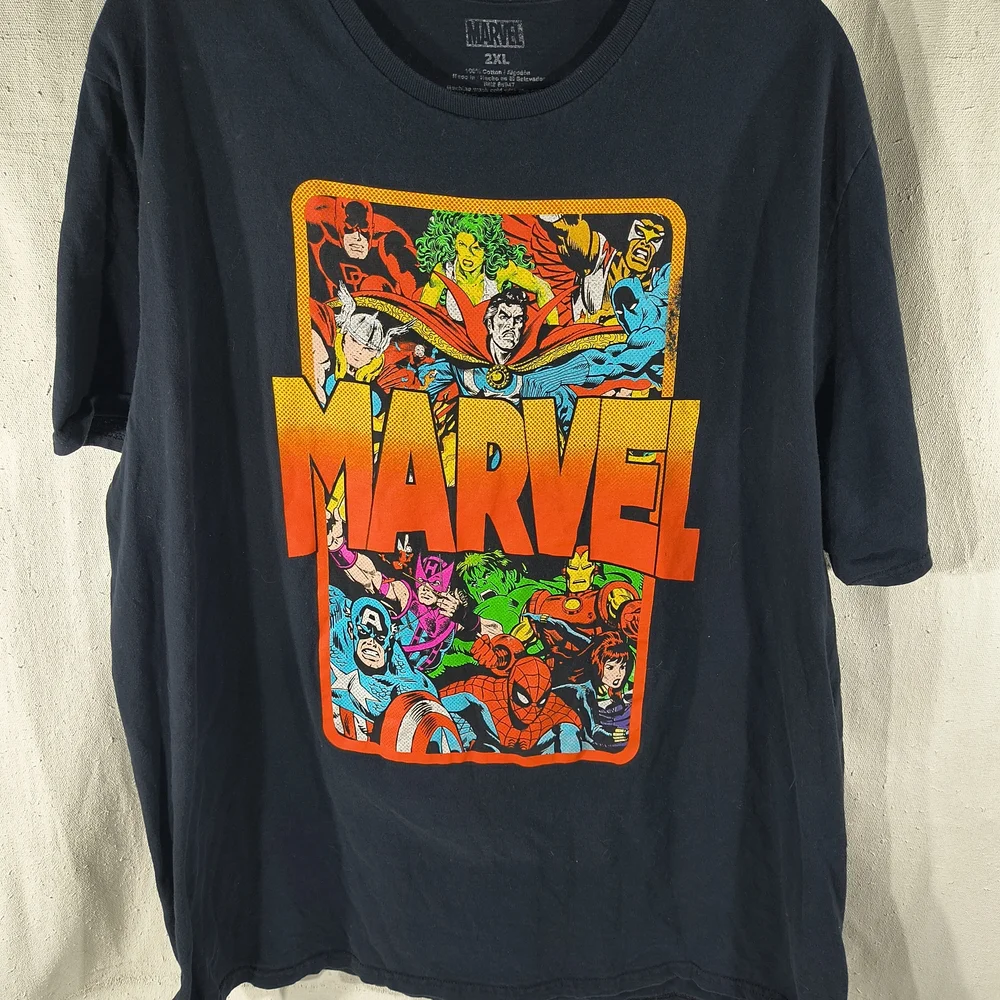 Marvel Unisex Size 2 XL Black Tee with Vibrant Super Hero Graphics